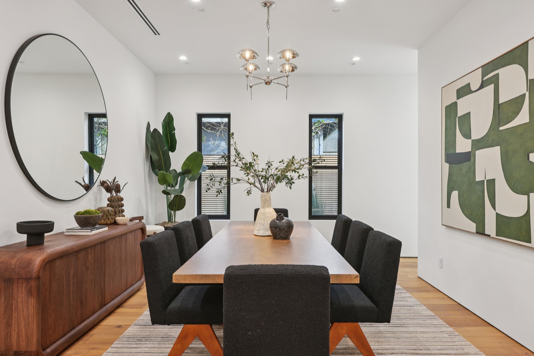 Dining room with wood table and contemporary art